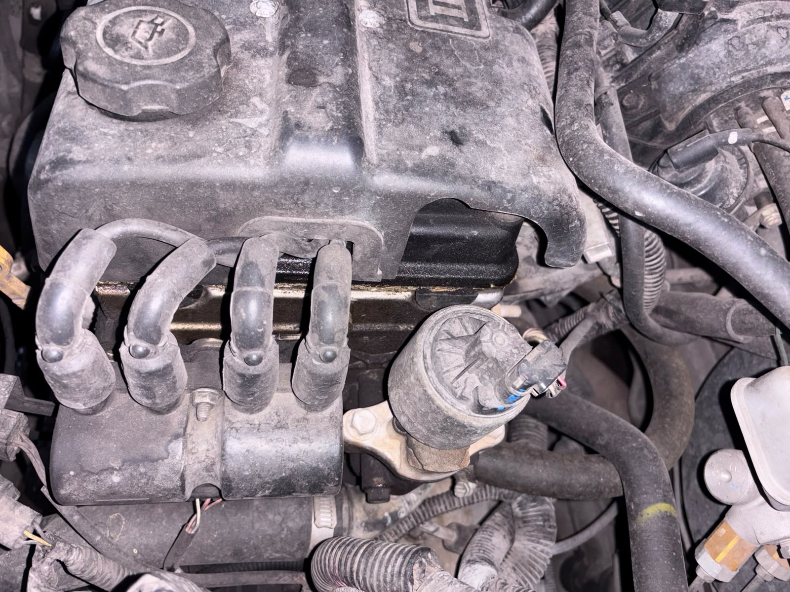 Cables y bujías revisados durante una afinación en AUTOTLAN Ixtapaluca